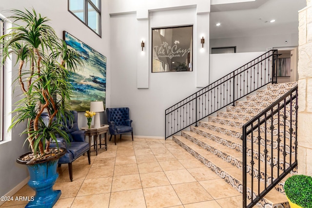 stairs with tile patterned floors