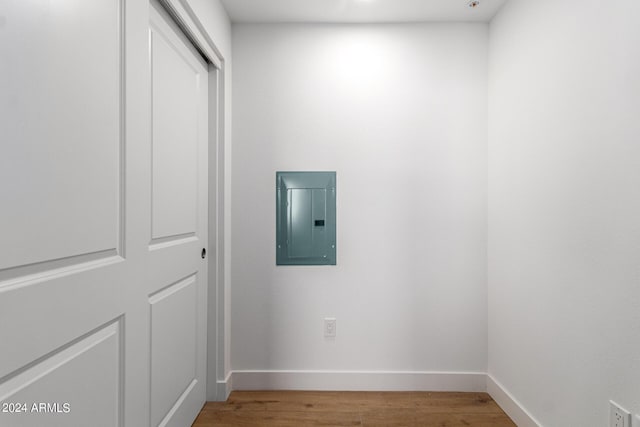 interior space with wood-type flooring and electric panel