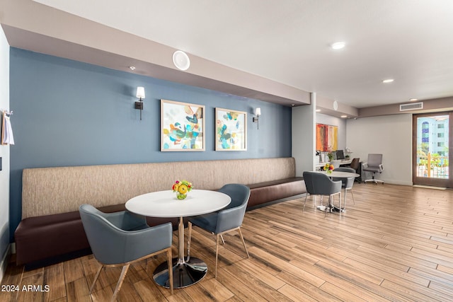 dining area featuring light wood-type flooring