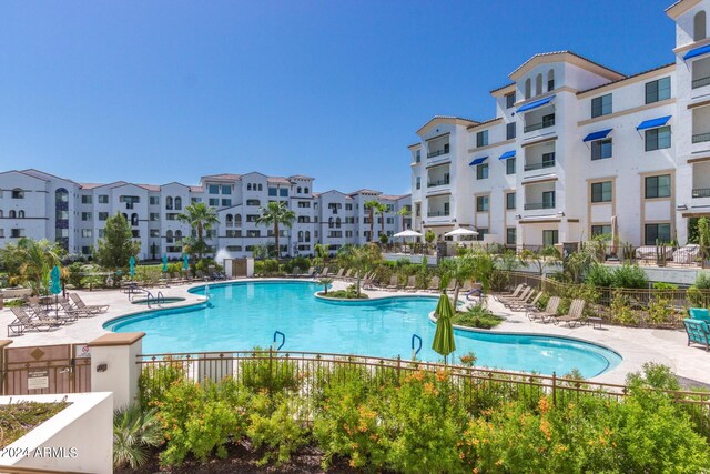 view of swimming pool with a patio