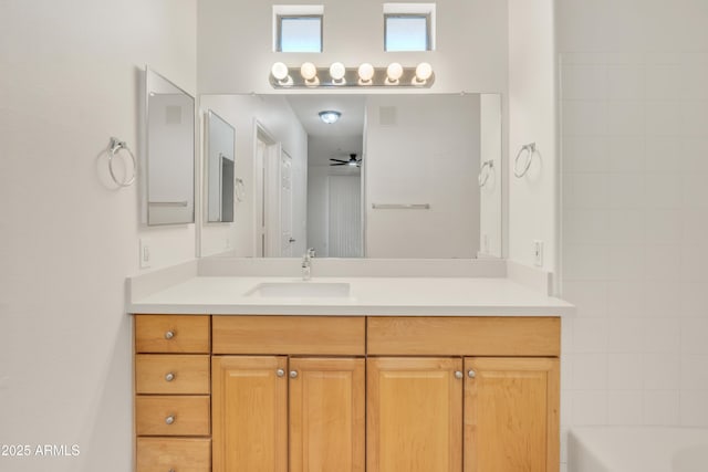 bathroom featuring vanity and ceiling fan