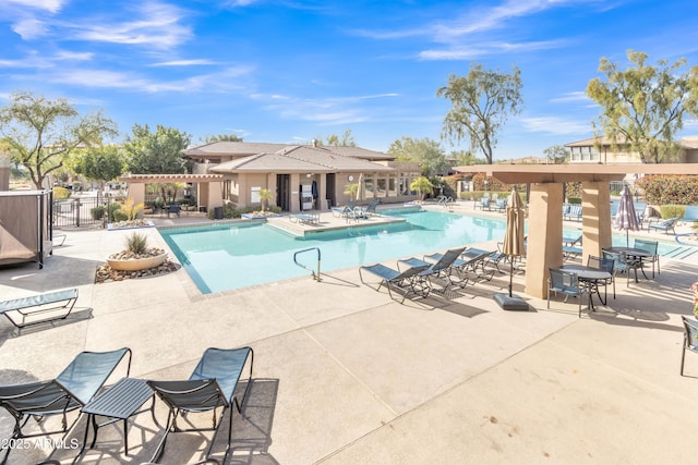 view of pool with a pergola and a patio area