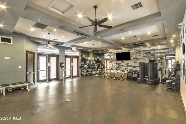 workout area with french doors and ceiling fan