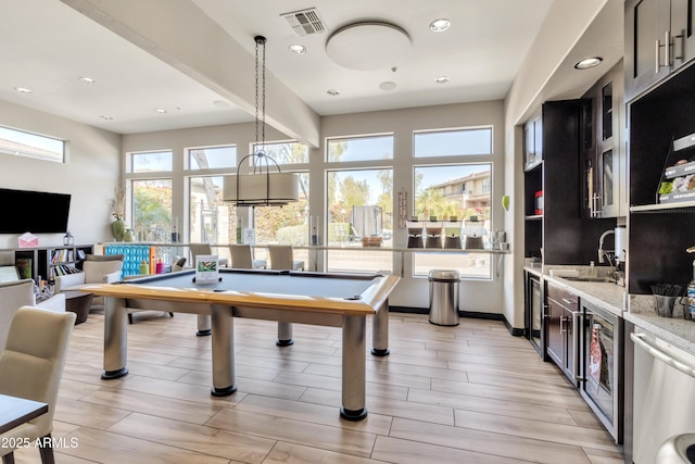 playroom featuring wine cooler, billiards, and sink