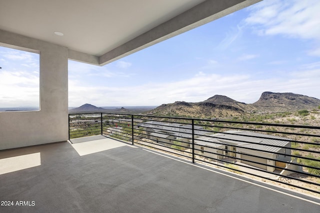 balcony featuring a mountain view