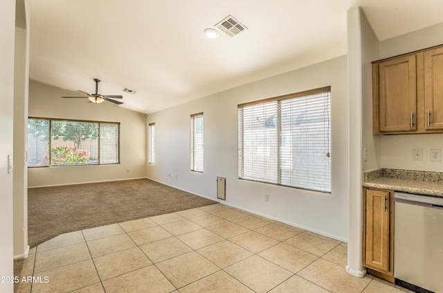 17617 W Corrine Dr, Surprise, AZ 85388 - empty room featuring healthy amount of natural light, a ceiling fan, light tile patterned flooring, light carpet, and lofted ceiling