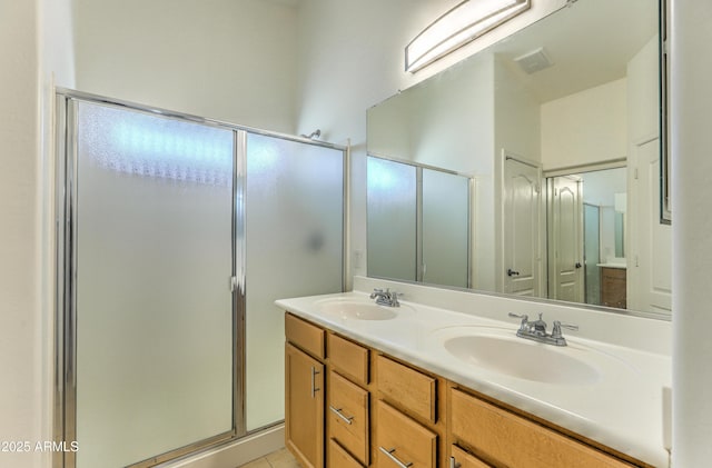 17617 W Corrine Dr, Surprise, AZ 85388 - full bathroom featuring a stall shower and double vanity