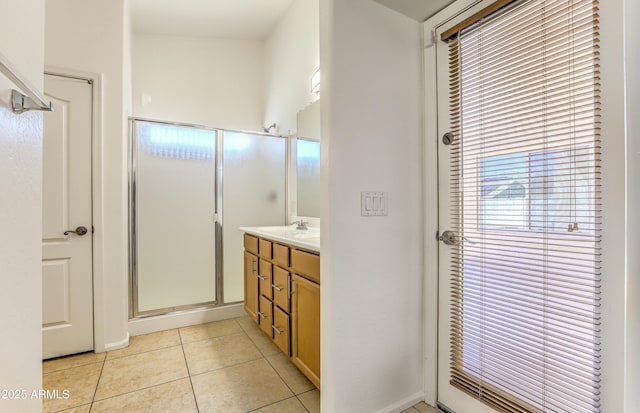 17617 W Corrine Dr, Surprise, AZ 85388 - full bathroom featuring a stall shower, vanity, and tile patterned flooring