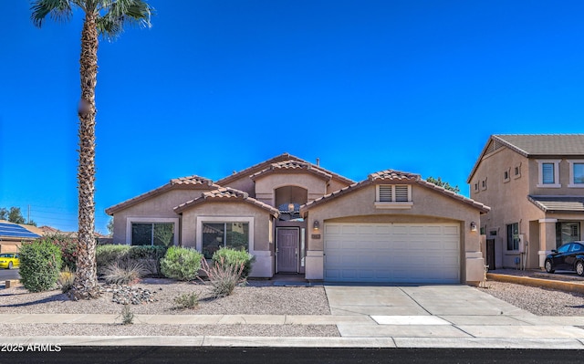 17617 W Corrine Dr, Surprise, AZ 85388 - mediterranean / spanish home with stucco siding, a garage, driveway, and a tile roof