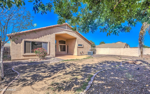 17617 W Corrine Dr, Surprise, AZ 85388 - rear view of property featuring stucco siding, cooling unit, a patio area, and a fenced backyard