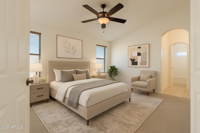 17617 W Corrine Dr, Surprise, AZ 85388 - bedroom featuring light carpet, lofted ceiling, arched walkways, ceiling fan, and ensuite bathroom