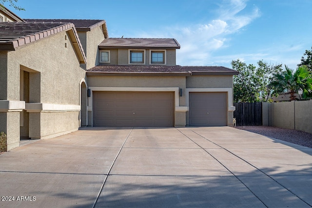 view of front of property featuring a garage