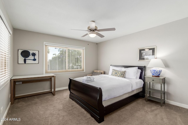 bedroom with light colored carpet and ceiling fan