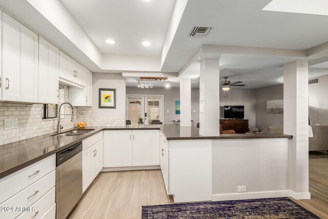 4525 N 66th St Unit 70, Scottsdale, AZ 85251 - dining area with a tray ceiling and wood-type flooring