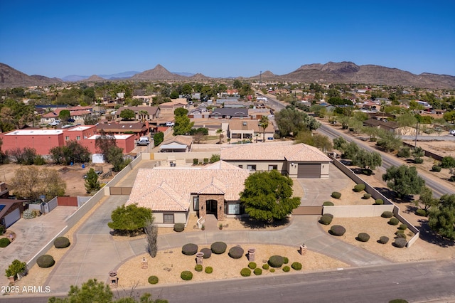 aerial view featuring a mountain view and a residential view