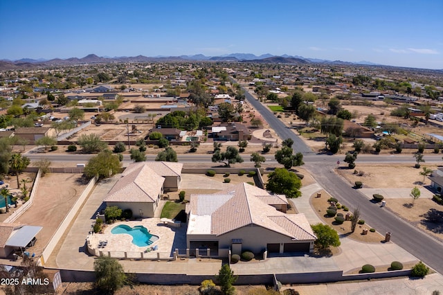 bird's eye view with a mountain view