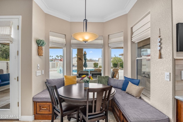 dining room featuring ornamental molding