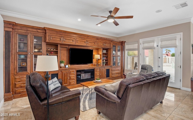 living room with visible vents, french doors, ceiling fan, and ornamental molding