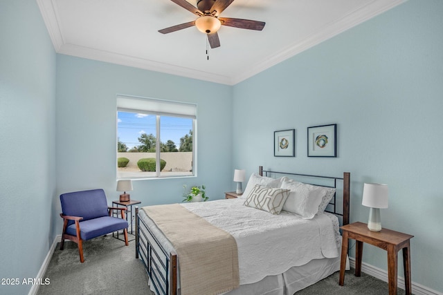 bedroom with a ceiling fan, crown molding, baseboards, and carpet floors