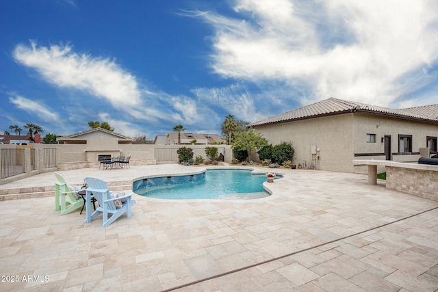 view of swimming pool featuring a patio, a fenced backyard, and a fenced in pool