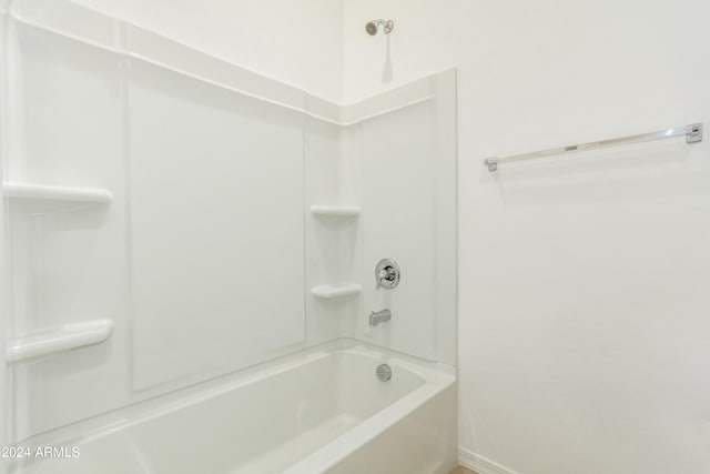 bathroom with shower / bathing tub combination