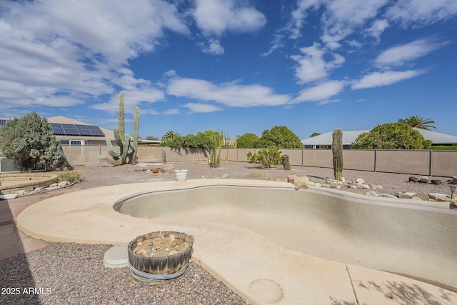 view of swimming pool featuring a patio area and a fenced backyard