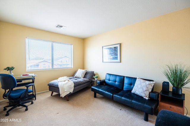 interior space with carpet floors, visible vents, and baseboards