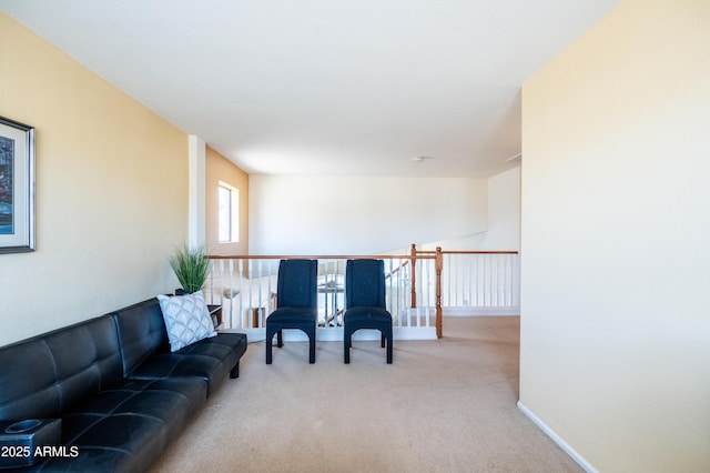 living area with carpet flooring