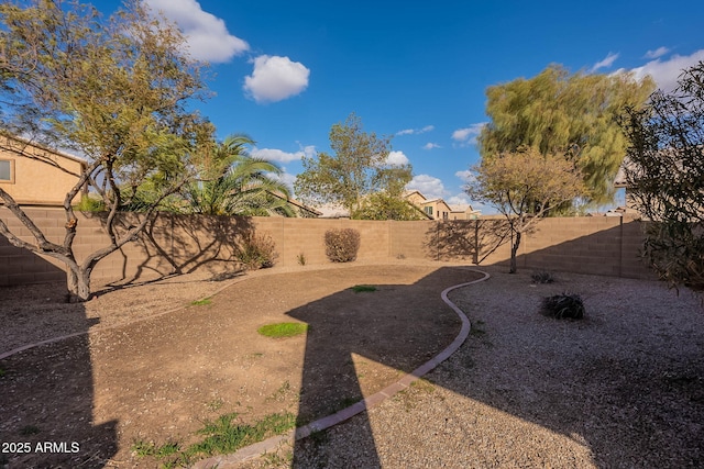 view of yard featuring a fenced backyard