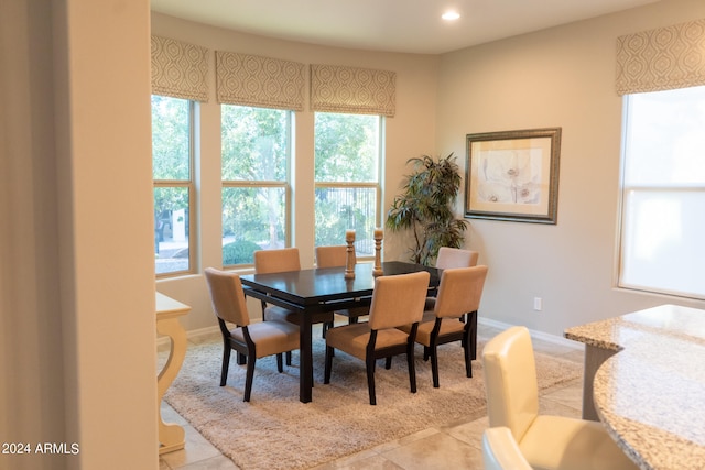 view of tiled dining space