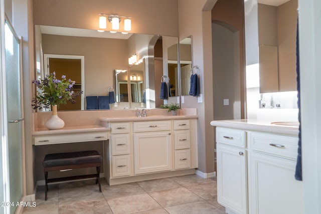 27002 W Oraibi Dr, Buckeye, AZ 85396 - bathroom with tile patterned floors, toilet, a stall shower, and baseboards