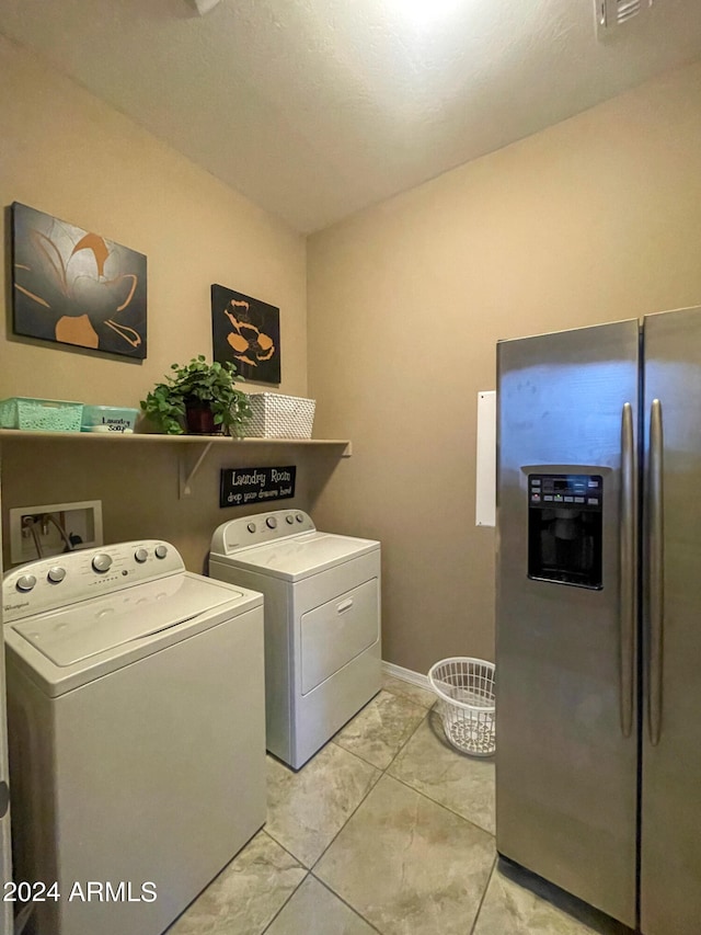 washroom with independent washer and dryer