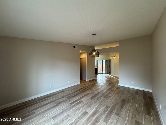 unfurnished dining area with hardwood / wood-style flooring