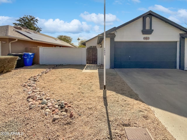 view of side of home with a garage