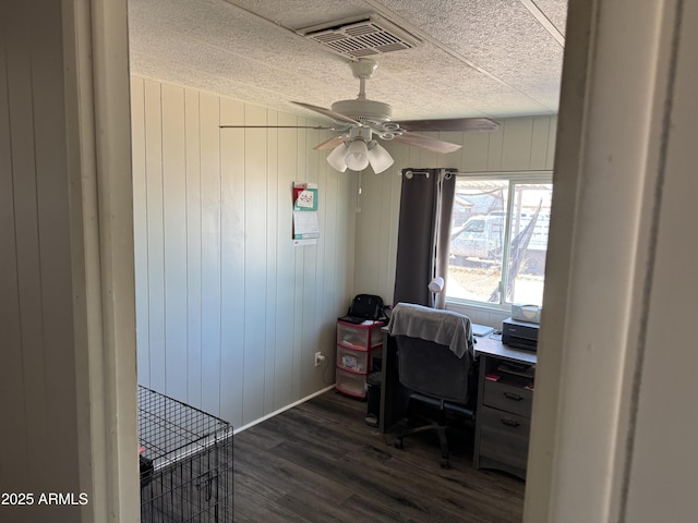 1776 S Lawson Dr, Apache Junction, AZ 85120 - home office with dark wood-style floors, ceiling fan, and a textured ceiling