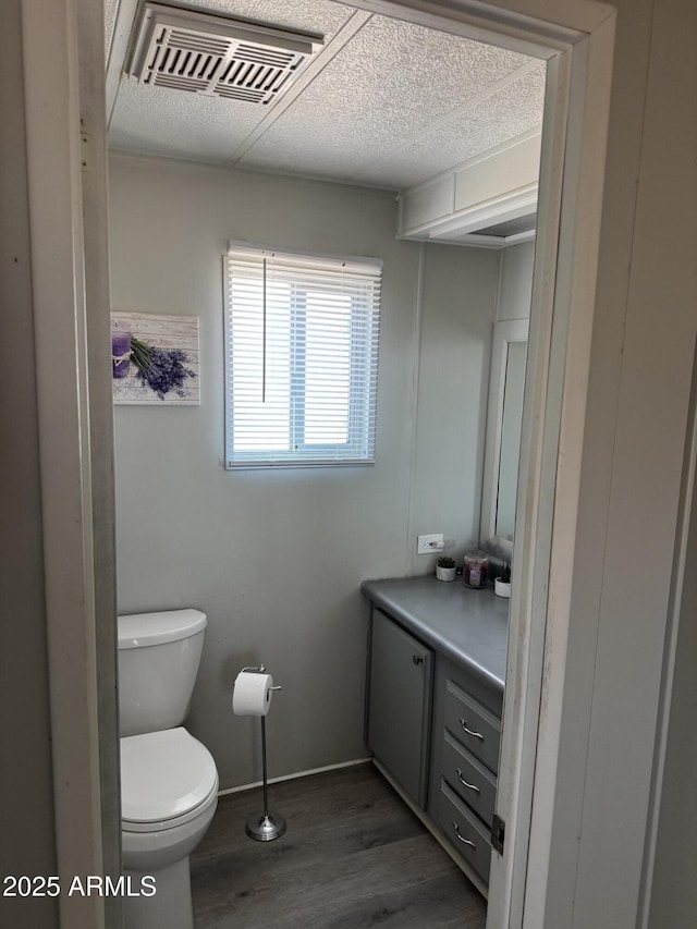 1776 S Lawson Dr, Apache Junction, AZ 85120 - bathroom with wood finished floors and vanity