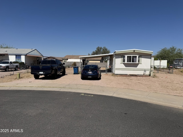 1776 S Lawson Dr, Apache Junction, AZ 85120 - manufactured / mobile home featuring driveway and a carport