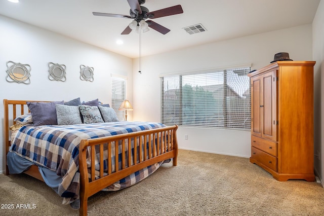 bedroom with recessed lighting, light colored carpet, a ceiling fan, baseboards, and visible vents