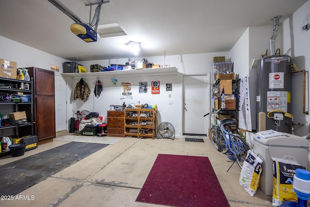 garage featuring a garage door opener and water heater