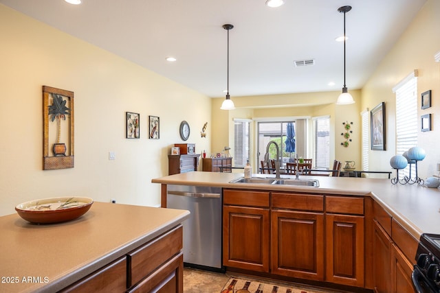 kitchen with recessed lighting, a sink, visible vents, hanging light fixtures, and stainless steel dishwasher