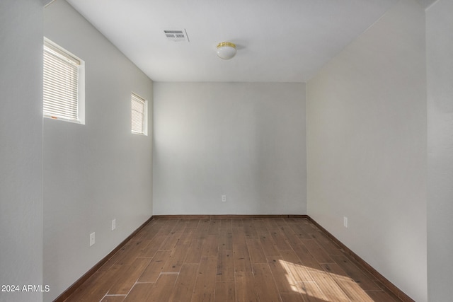 spare room featuring hardwood / wood-style flooring