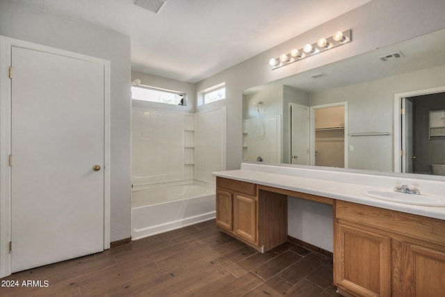 bathroom featuring hardwood / wood-style floors and vanity