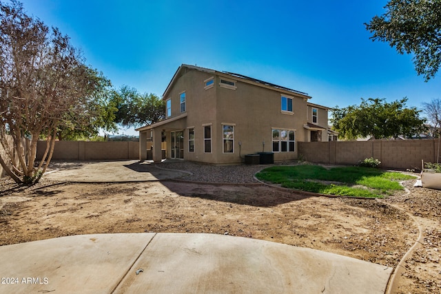 rear view of property with a patio area