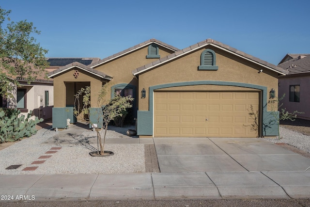 view of front of house with a garage