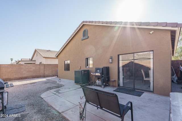 back of house featuring a patio area and central AC unit