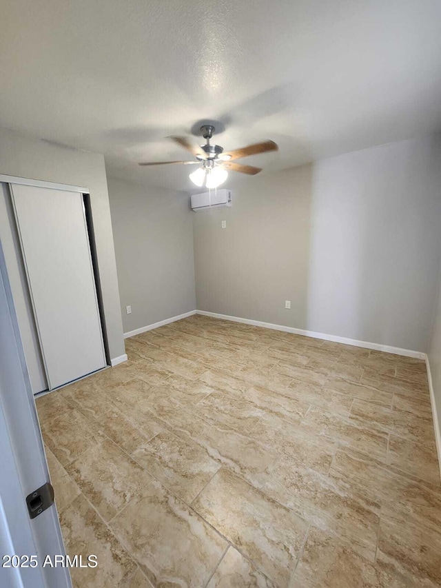 unfurnished bedroom with baseboards and ceiling fan
