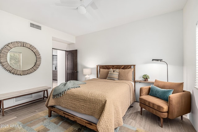 25825 N 106th Way, Scottsdale, AZ 85255 - bedroom with wood finished floors and a ceiling fan