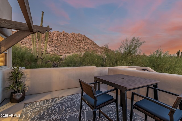 25825 N 106th Way, Scottsdale, AZ 85255 - patio terrace at dusk featuring a balcony and a mountain view