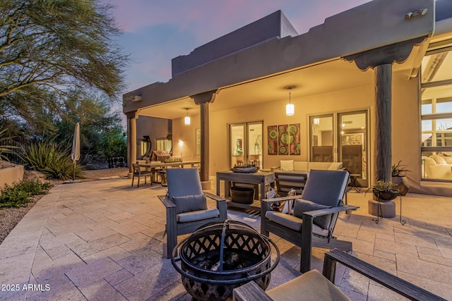 25825 N 106th Way, Scottsdale, AZ 85255 - view of patio with outdoor dining area and an outdoor living space with a fire pit