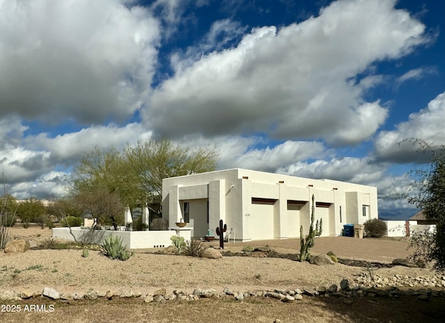 exterior space featuring a garage